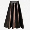 Skirts PU Faux Leather Hollow Out Elegant Women Loose Casual Ladies 2023 Autumn Winter High Waist A-line Midi L846A