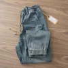 Mäns jeans Autumn och Winter Retro Sand tvättade blå trendig Pure Cotton Drawstring Boys Casual Pants Harem