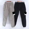 Men byxor Konng gonng multi stora fickor byxor vår och sommar ny mode märke retro mäns jogging leggings Men317a