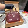 Bolso de mano de lujo bolso de diseñador letra V Bolso pequeño de concha moda mujer Bolso de cuero Estilo clásico Simple en múltiples colores muy bueno