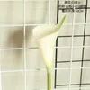 装飾的な花10pcs pu calla lily人工ホームリビングルーム装飾偽の花束パーティーウェディングフラワーアレンジ