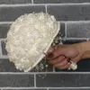 Fiori decorativi Bouquet di fiori di rosa di seta fatti a mano pieno di perle Set da polso con spilla artificiale per matrimonio