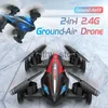 أجهزة محاكاة جديدة 2.4G D85 MINI RC LAND and AIR DRONE FLYING FLYING STUNT CAR 2-in-1 Dual Mode Racing 3D Flip Professional Quadcopter Drones Toys Boy X0831