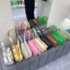 Дизайнерские сумки сумки для сумки конфеты Mini Jodie Woven Macaron Fashion Piglow Универсальная и простая косое плеч