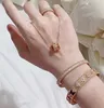 Brazalete de diseñador de marca de lujo, brazalete de cobre con cristal completo de trébol de cuatro hojas y flores para mujer, joyería con caja de regalo de fiesta