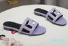 Designer platte schoenen Luxe slipper dames Geborduurde sandalen Mode Slippers Alfabet Slipper dames Zomer strandglijbaan Lage hakken voor dames