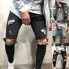 Jeans da uomo 2022 Autunno Moda Street Style Uomo Gamba stretta Pantaloni slim sfilacciati Streetwear Pantaloni a vita bassa Vita media Strappato Fori Denim 237C