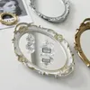 Piatti decorativi Nord Europa Piatto decorativo Vassoio portaoggetti Piatto ovale Espositore per gioielli Specchio rotante per caramelle Specchio per trucco Regalo per ragazza 230831