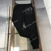 22SS Erkek Kadın Tasarımcı Pantolon Metal Üçgen Etiket Fermuarı Cep Naylon Milan Pantolon Erkekler Woking Pantolon Siyah Xinxinbuy S-XL291C