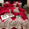 Set di biancheria da letto 2023 Set da sposa rosso di fascia alta di marca di lusso Scava fuori pizzo Copripiumino in cotone setoso