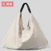 Large capacity and lightweight umbrella shaped tote bag for female niche lazy style cotton linen handbag for leisure commuting underarm bag 230831