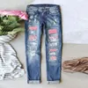 Dżinsy dżinsowe dżinsy dla kobiet ładunkowe spodni moda moda zgrana do dziury plasty patchwork długie dżinsy dżinsowe spodnie spusty 230831