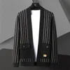 Maglioni maschile 2023fall uomini mascheri coreani designer di cardigan giacca cardigan giacca nera contrasto a strisce patchwork stampa 230831