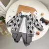 Set di abbigliamento Autunno stile college Fratello Look Set di vestiti Argyle Cappotto lavorato a maglia in cotone Gonna Pantalone Camicie Pagliaccetto Completo per bambini 230831