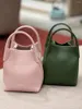 Bolsas de noche Lp Marca Cuero de vaca con marcas de lichi Conmutaciones Bolso de loro simple Bolso de un solo hombro Paquete cruzado oblicuo Cubo Lady