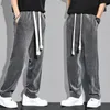 Calças masculinas para baixo calças de inverno engrossar calças de veludo esportes corredores sweatpants tamanho grande solto calças quentes exterior wear 230831