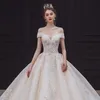 2023 princesa Una línea vestidos de novia con cuello en V largo brillante bling vestidos de novia de encaje grande largo tren de barrido más tamaño vestido de novia de playa árabe turco brillante vestido de noiva