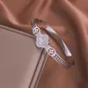 Дизайнер ван Кли браслет роскошная верхняя титановая сталь Новая бриллиантовая белоснечная белостная четыре листовой травы с красочным браслетом для пряжки