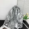 New Large Capacity Silver Drawstring Backpack for Female Minority Pleated Commuter Backpack Simple and Lightweight Travel Book Bag 230831