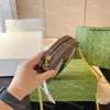 Designer cirkulära väskor små plånböcker topp original 4 färg mynt handväska modekedja rund handväska messenger crossbody axelväska med låda
