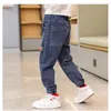 Jeans chłopcy dżinsowe odcinki dziecięce Sprężyn Spring Autumn Pinted Foot Kids Casual Pants 230830