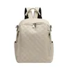 Factory sales women shoulder bag 4 colors simple Joker solid color embossed leather leisure backpack large capacity double zipper fashion travel backpacks 22095#