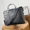 Evrak çantası tasarımcı çantası lüks dizüstü bilgisayar çantası düz renkli mektup tasarım büyük kapasiteli deri evrak çantası iş tarzı erkek dizüstü çantası Noel teslimat toz çanta güzel