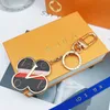 fashion luxury women for Designer keychain Golden Leather Sunflower lvii Keychain Matching Car Pendant Metal Fashion Personalized Creative llaveros bag charm