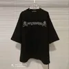 メンズTシャツの首謀者ワールド2024夏のトレンドスカルヘアバブル粒状印刷MMWルーズプラスメンズ用の短袖Tシャツと