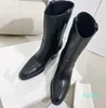 Botas de caballero de cuero encerado Hee grueso Bota de vaquero occidental Moda puntiaguda Medio botines para mujeres diseñadores de lujo zapatos fábrica Calzado