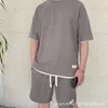 رجال المسارات الأزياء رجالي الملابس بدلة وافل الصيف القصيرة القميص القميص القميص sweatpants اثنان قطعة مجموعة 230228