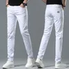 Jeans masculin printemps d'été mince denim slim slim fit européen américain marque haut de gamme petit pantalon droit xw6010-1