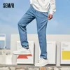 Jeans masculinos Jeans semir Men Spring Slim Feet Man Denim Troushers estilo coreano Calças de tendência azul da moda Blue 230301