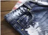 Erkekler Kot yeni moda markası sonbahar kış patchwork yırtılmış işlemeli streç moda delikler düz denim sorunları y2303