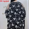 Dwuczęściowe spodnie damskie Ed Iqyipai Zestaw Mesh Tabilk Spliczone krótkie luźne letnie koszulki i szorty 2PCS Casual Sequinis Thin Suit 230228