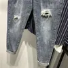 Jeans da uomo Estate 2023 Stile Strappato Patch Studente Casual Moda da uomo Slim Personalità Mendicante Adolescente Lunghezza caviglia Denim