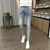 Mäns jeans Våren Autumn 2023 Studenter Street Denim Men's Slim Feet Korean Youth Thin Stretch All-Match Casual Teen Pencil Pants