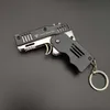 porte-clés alliage plastique M1 mini pendentif pistolet à élastique pliant peut être utilisé pour 6 pistolets à balles molles jouets pour enfants consécutifs.