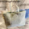 Designer neue Frauen Herbst Winter 23 neue Produkt Einkaufstasche eine Schulter tragbare Plüsch Einkaufs bonbonfarbenen Tasche