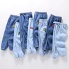 Jeans chłopcy dziewczęta lato swobodne cienkie długie spodnie moda solidne kolor dzieci kreskówki haft dzieci dzieci dżinsowe ubranie 1-6Y