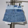 Gonne 2023 Moda primavera ed estate Impiombatura Swing Tasca a vista Panno Mezza gonna in denim Vita di riparazione sexy Mini da donna