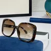 Ny populär fyrkantig ram Mens kvinnor designer solglasögon speciellt glasögon klassisk röd och grön webbbing design semester rese fotokvalitet med originalbox