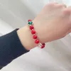 Strand Natural Crystal Red Resins armbanden voor vrouwen