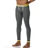 Мужские спортивные костюмы Термическое нижнее белье Мужчины Длинные Джонс сгущают сексуальные мужские под брюками дно пижама с плотным леггинсовым мешочком.