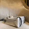 Tasarımcı Çanta Tuval Alışveriş Çantaları Büyük Kapasiteli Kılıç Çanta Lady Cutse Lüks Çantalar Okul Şeridi Dekorasyonu Kozmetik Depolama Çantaları Taşınabilir Tates Çanta