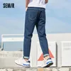 Jeans masculinos Jeans semir Men Spring Slim Feet Man Denim Troushers estilo coreano Calças de tendência azul da moda Blue 230301