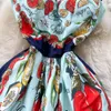 Robe à bretelles imprimée de style ins européen et américain avec ceinture Coupe ajustée Grande balançoire Robe de princesse étrangère A-line