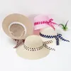 Cappelli a tesa larga Cappelli estivi per ragazze Cappello di paglia con fiocco e nastro Protezione esterna Cappellini Panama da donnaLarghezza