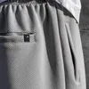 Yaz Teknik Kumaş için Mens Şort 612# Petek Mesh Yüzey Kumaş Tasarım Logo Hook Baskı Partisi Pantolonlar Gevşek Sokak Çınlaması Moda Kısa Pantolon