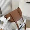 dam Halvmåne tonåring triomf svart crossbody väska Damväska män plånbok äkta läder Axelväska Lyx handväska Designer clutch skylt i klarmetall